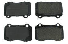 Load image into Gallery viewer, CENTRIC BRAKE PARTS 106.06010 - Posi-Quiet Extended Wear Brake Pads with Shims a image